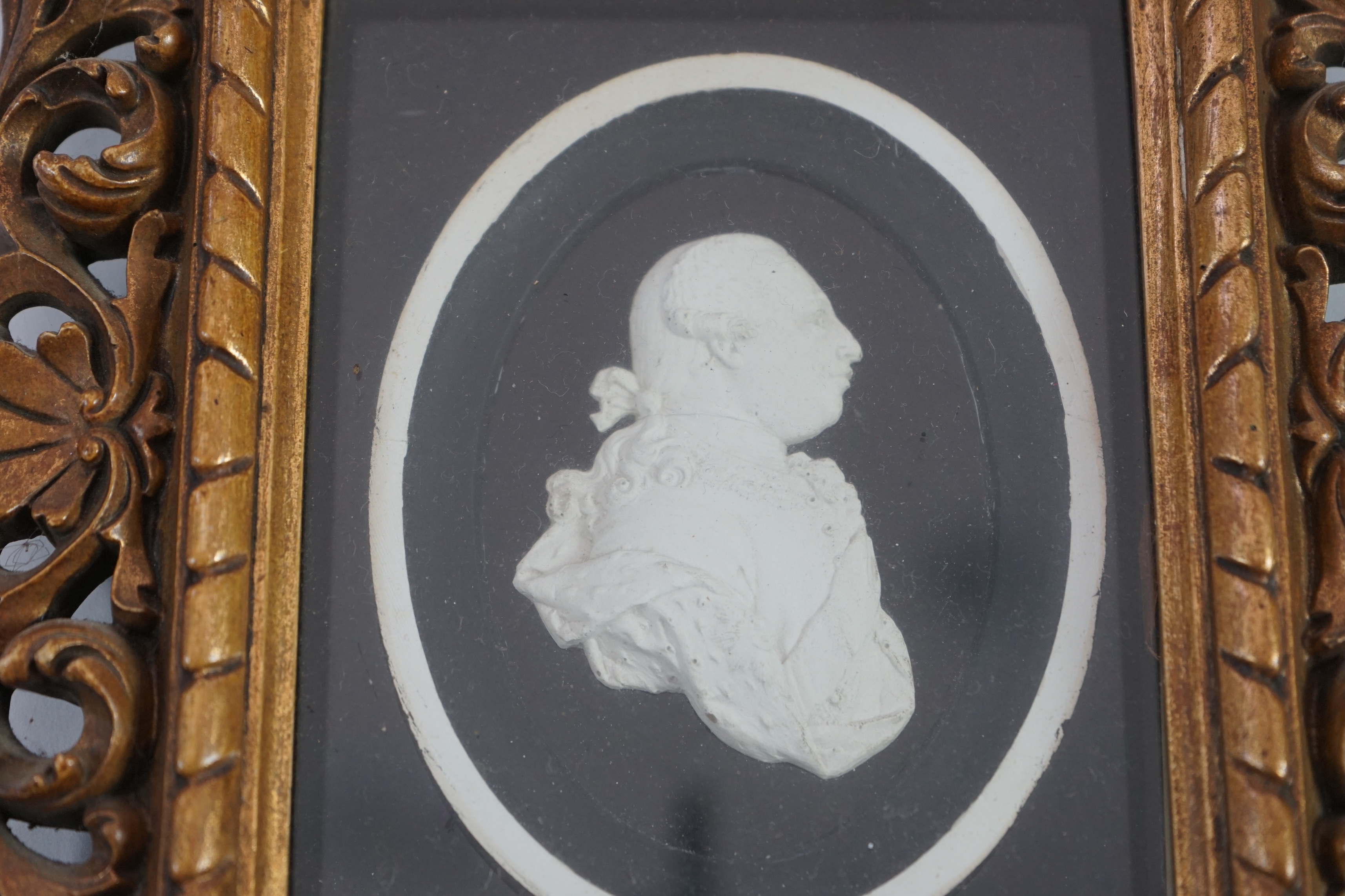 A Tassie style plaster relief of George III